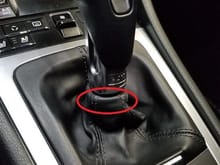 Look at the circled area.  Imagine a zip tie underneath that area of the boot.  The zip tie secures the boot to the PDK shift.  The boot can still move up and down along the shaft (that' what she said), but the tie gives the boot a nice finished "rolled over" look.  You secure the shaft to the boot by pulling the bottom of the boot over the PDK knob and attaching the zip tie where the end of the boot meets the shaft, 