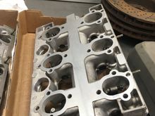 Put them on a table to restore flatness