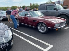 Young man going for a cruise in his 1969 Aston Martin DBS