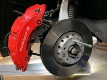 Cayenne TT caliper is massive & really heavy. You lose the ability to quick change pads.  The caliper & the 390mm rotor seem like overkill on a vehicle that weighs 2000lbs less. 