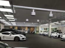 3 white GT4, one rhodium silver GT4. Mine is the one in the back. One white spyder?