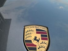 Current OEM Porsche Cayenne Hood crest
