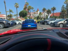Headed out for a our drive. The Del Coronado hotel in the background./ We had so many cars heart the Coronado police held up traffic both ways to allow all the Porsche's to exit.