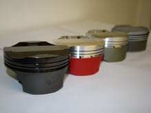 A small selection of pistons with different coatings we tested.