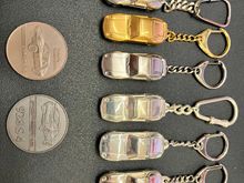 Key chains and collectible coins for sale (details listed on Facebook - Norcal 928 group)