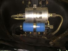 Fuel pump and filter as revealed by removing the sheet metal cover.