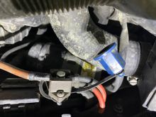 loose brown cable and blue cap