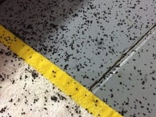 Black particles on the floor