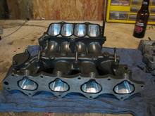 DIY ported intake manifold. Port stepped, dual butterflies removed and siamesed.