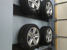 I made this tire rack to keep the winters from the daily driver tucked up and out of the way