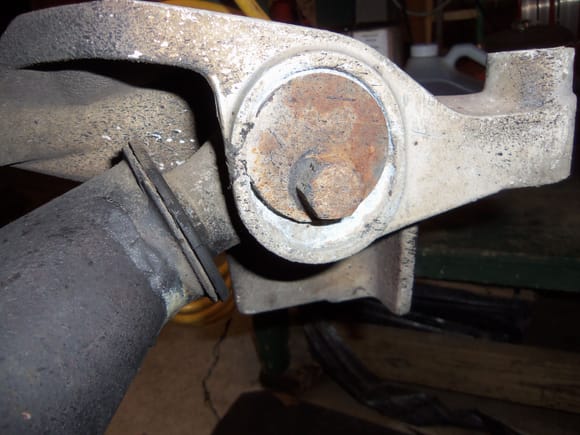 Passenger's side lower control arm front mount cam adjusting bolt. Disturbing amount of corrosion on the aluminum mount.