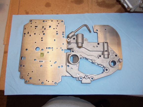 Assembled lower cover and separator plate.