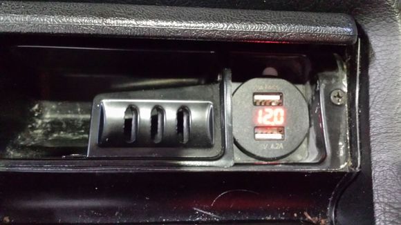 2 USB slots , and digital Voltage reading, in place of lighter.