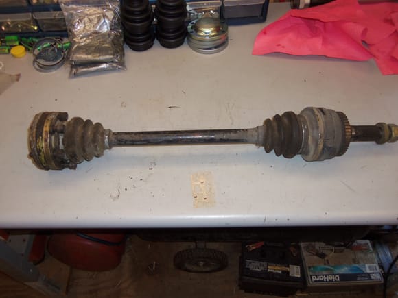 Driver's side CV axle assembly. Note:  the following pictures are of the driver's side axle, but are representative of the passenger's side axle as well.