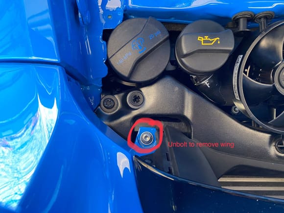 Once these bolts in red are removed on right and left side, slide wing straight back and you’ll feel it come out of the groove. 