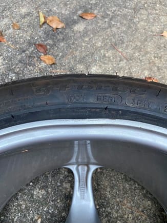 Bent rim with new (temporary) tire.