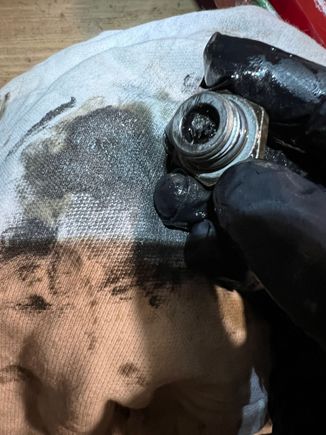 Drain plug with metal pulp