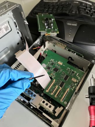 Installing the carplay board in my PCM. Note: that's a hex driver not a soldering iron. NO soldering or cutting of any wires is required! 