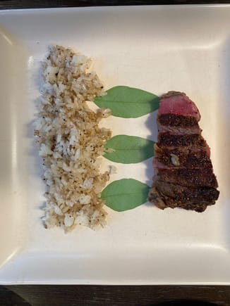 porterhouse with rice stir fried in beef fat