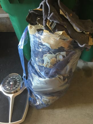 46 lbs. of old carpet and insulation