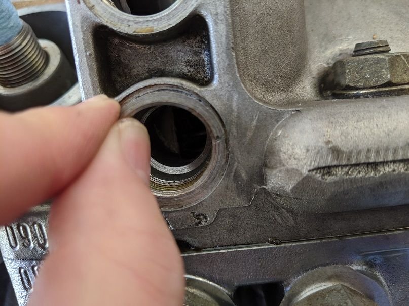 How do I repair oil cooler hose sealing ring surface on engine block