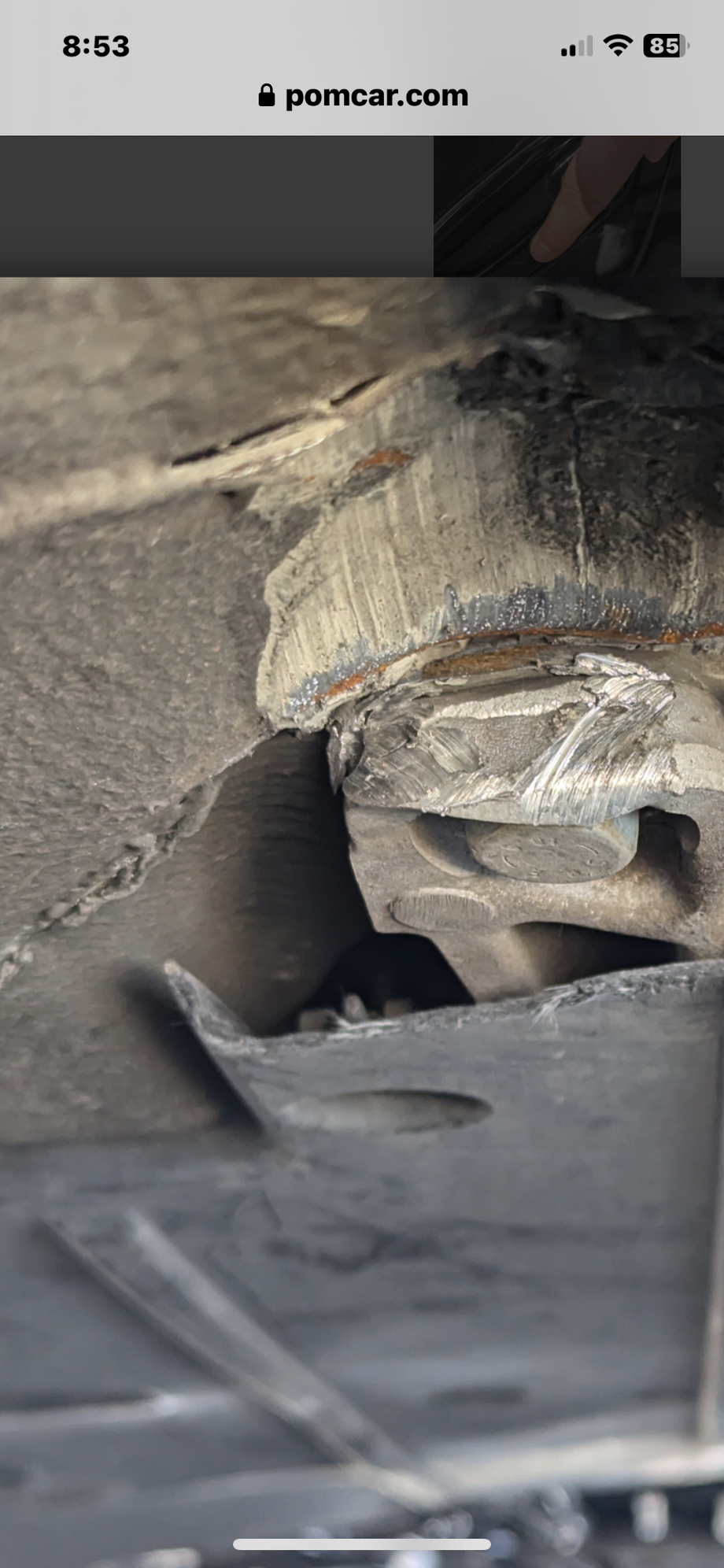 Hello, need some help with this photo of damage on a 997.1 that I am looking to purchase.  No driving issues and does not pull to right or left. Alignment is perfect. Concerned mostly about crack above bolt? No cover was torn off at some point. Thanks