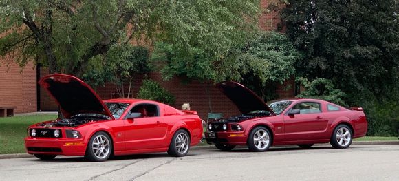 Our 2006 TorchRed GT and our friend Carol's 2006 RedFire GT