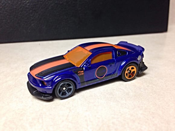 I got this SEMA Mustang today. It may be odd. But, Hotwheels has added some nice casting features like the adjustable front chin spoiler so it can run on the loops and still look cool and normal without a funky looking swept up angle and the fact that the car has headlights and taillights cast in from the window piece.