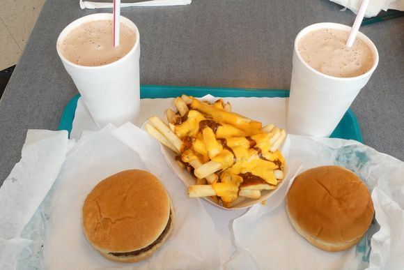 The famous chili fries in the middle of two shakes and burgers. Very tasty.