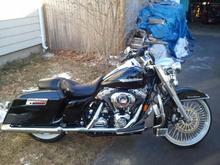 My 2008 Road King Classic dropped, hard bags and a 21" fat daddy spoke in front with a pin stripe white Metzler