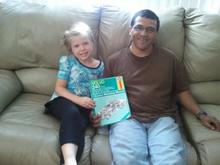 My grandaughter and I looking over my Haynes shop manual... I know its not the most complete manual, but it helps with the basics once you figure out the British jargon (14 mm spanner wrench, under the bonnet, etc.)