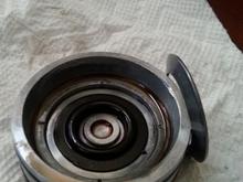 2014 12 29 11.51.54
The washer on the right is supposed to be flat and attached to the cover.