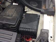 look carefully at the fuse box lid , it’s dusty never gets wet and is properly and easy to re fix the lid .Its mounted about an inch above the wheel arch so even if the scuttle was to flood and water spill over into the engine compartment both bat and fuse box would stay dry .