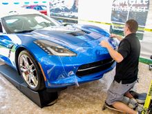 Marcus is installing XPEL ULTIMATE on the front bumper of this Corvette