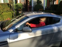 Mila driving the Aston Martin Vantage V8