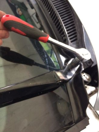 14 mm ratchet remove them .If they have not been off for a while this may need a bit of penetrating oil and twiddling.Use something like copperslip when you put them back 