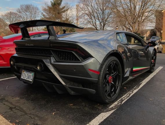 This Lamborghini Huracán Performante was at Katie's Coffee House in Virginia back in December. There's a red Porsche 991 GT3 parked along with it as well.