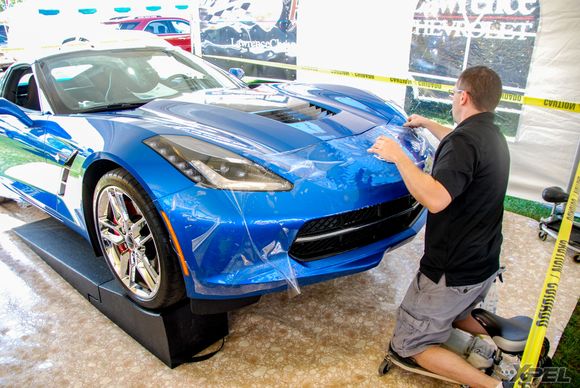 Marcus is installing XPEL ULTIMATE on the front bumper of this Corvette