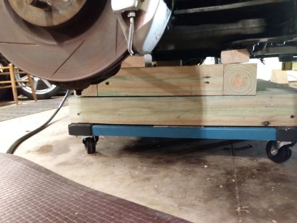 I built a couple of work frames from 4 furniture dolleys and 4X4s.