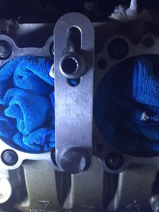 Align tool with 10 mm hole alignment pin.