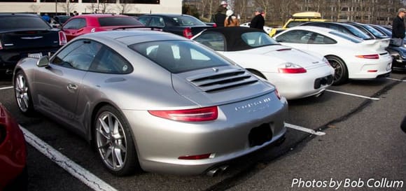 A trio of Porsches.