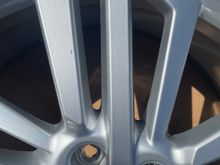 The only blemish I can find. Rock chip