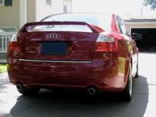 Here is a pic from the rear. You can see the Ultrasport rear bumper, Zender rear spoiler, S4 door blades, shaved badges, and Magnaflow catback.