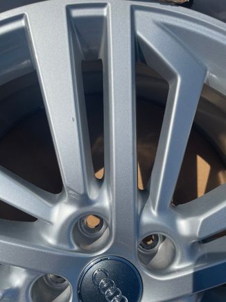 The only blemish I can find. Rock chip