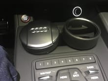 The oem key organizer and ashtray (for chewing gum, cash/coins) that fit in the cup holders.  