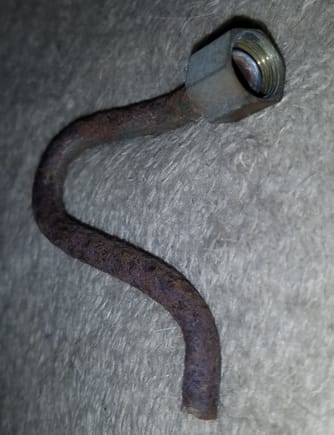 This is the piece of vacuum line that snapped off the bracket in the first image.