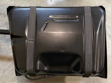 Bottom side of fuel tank with padding installed.  