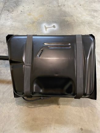 Bottom side of fuel tank with padding installed.  