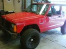 1995 Cherokee XJ Torch Red 4.0 4x4 5 speed 2 door.... yeah