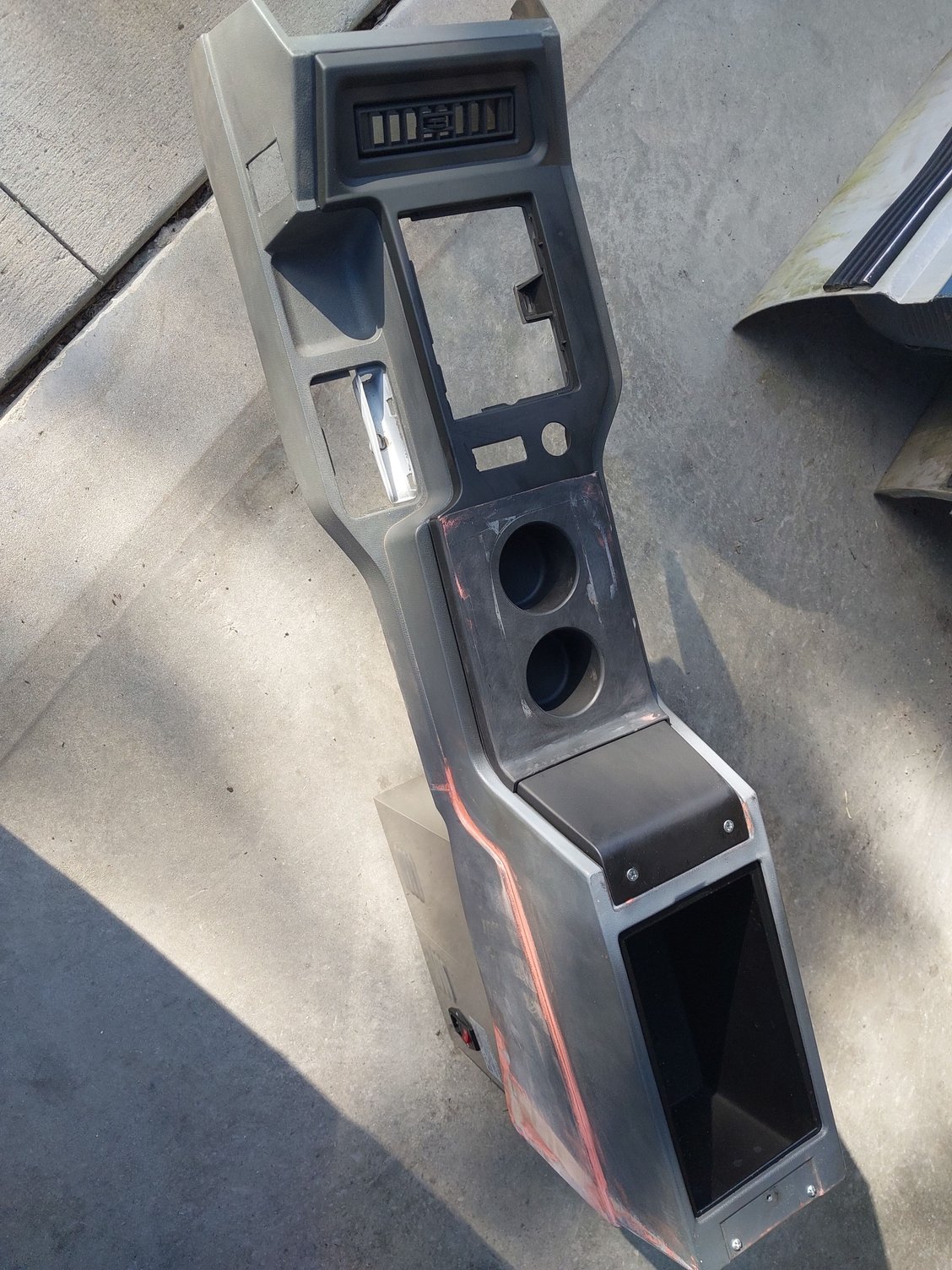 Cupholder insert is nearly finished. I've still got some bondo to do on it but its practically done.